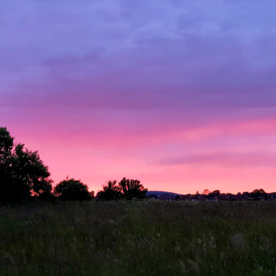 A beautiful sky going from blue to red at dusk